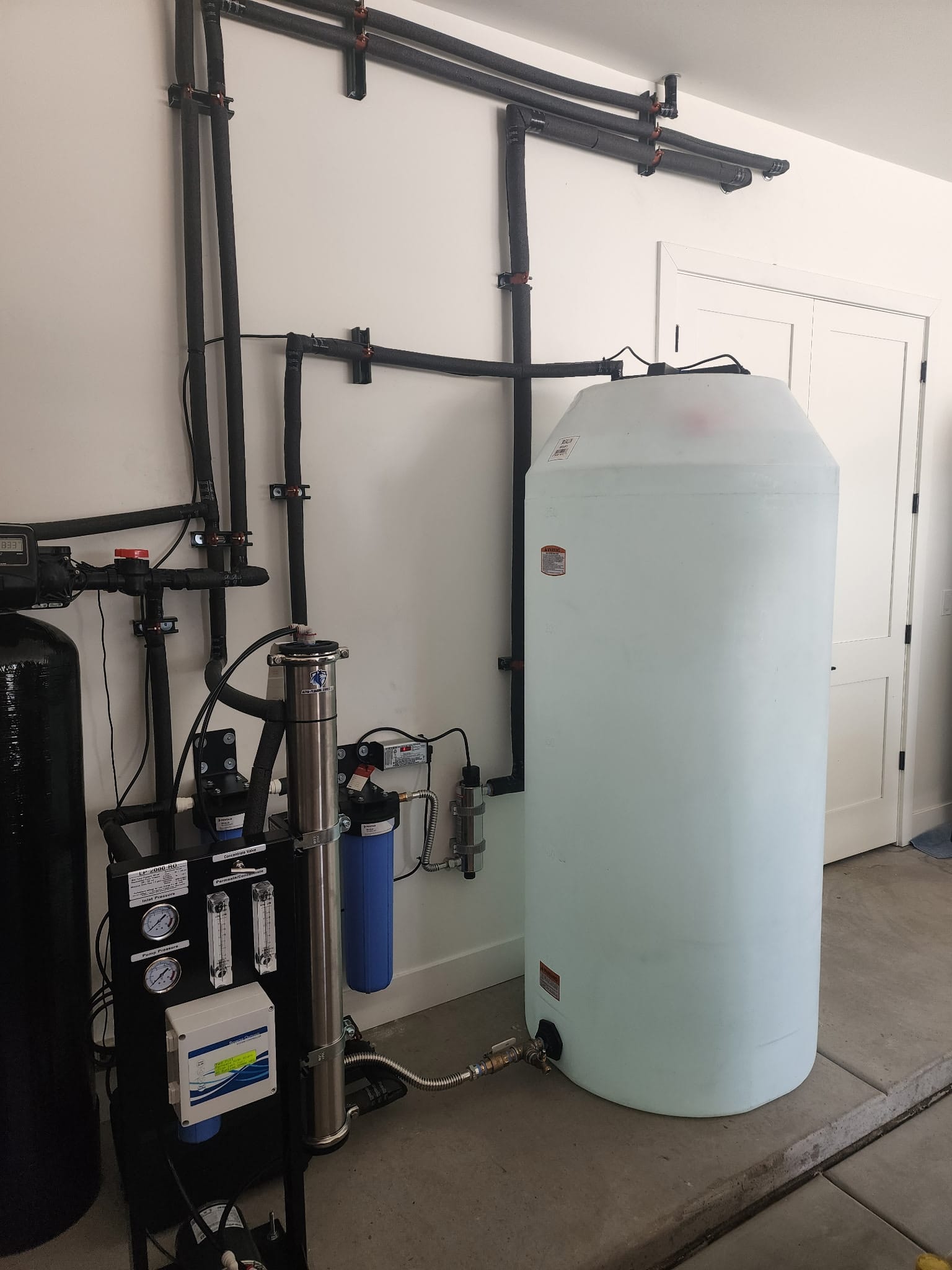 Whole-home reverse osmosis and filtration install with storage tank by Alpha-Plumbing Services in Goodyear AZ